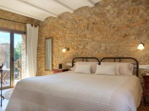 Postel nebo postele na pokoji v ubytování Can Barrull-Costa Brava-Emporda