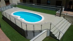 The swimming pool at or close to Littore TORMES con Parking, AA y Piscina