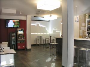 A television and/or entertainment centre at Hotel Rural Villa de Berlanga