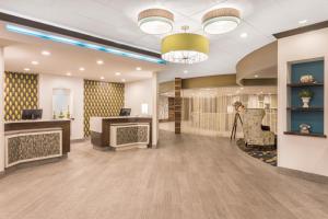 a lobby of a hospital with a waiting room at Wyndham Garden Summerville in Summerville +29 photos