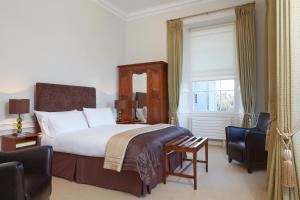 a hotel room with a bed and a window at Maynooth Campus Accommodation in Maynooth