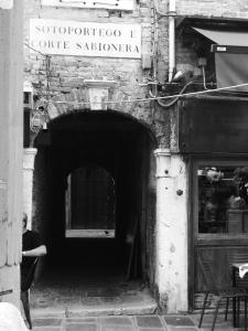 a man standing in front of a tunnel at Piccolo Tiepolo in Venice