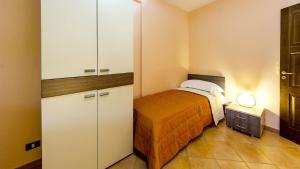 A bed or beds in a room at Residence Hydria
