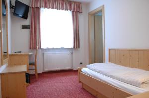 Postel nebo postele na pokoji v ubytování Hotel Falzares