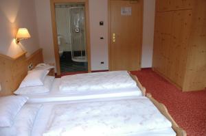 Postel nebo postele na pokoji v ubytování Hotel Falzares