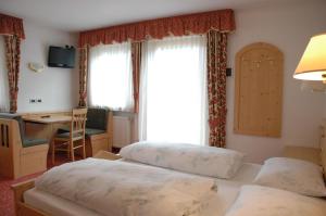 Postel nebo postele na pokoji v ubytování Hotel Falzares