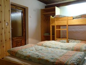 Postel nebo postele na pokoji v ubytování Ferienhaus Anderles-Alm