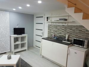 Kjøkken eller kjøkkenkrok på Little Luxury Apartment