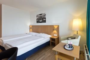 Arthotel ANA Neotel 객실 침대