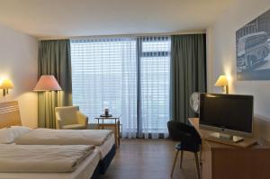 Arthotel ANA Neotel TV 또는 엔터테인먼트 센터