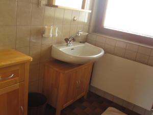 Ein Badezimmer in der Unterkunft Apartmenthaus Rupitsch