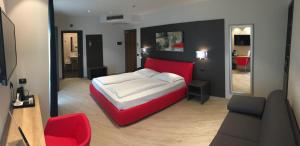 Postel nebo postele na pokoji v ubytování Hotel Villa Rosa