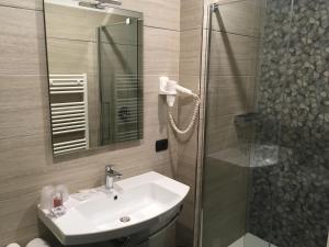 Koupelna v ubytování Hotel Villa Rosa