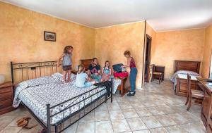 Postel nebo postele na pokoji v ubytování Hotel Casa Didé