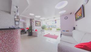 Posezení v ubytování Hotel Marina Suites By GEH Suites