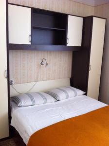 Postel nebo postele na pokoji v ubytování Guesthouse Mimas