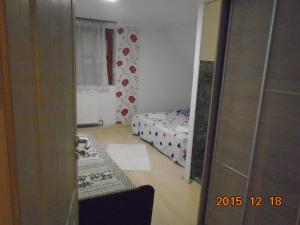 A bed or beds in a room at Micófogadó