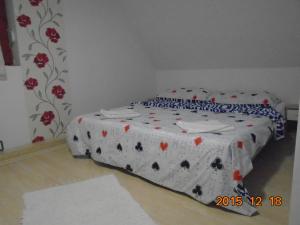 A bed or beds in a room at Micófogadó