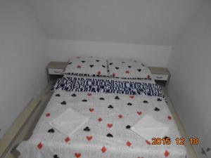 A bed or beds in a room at Micófogadó