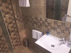 Koupelna v ubytování Hotel Almadraba