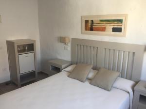 Postel nebo postele na pokoji v ubytování Hotel Almadraba