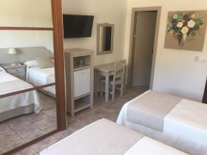 Postel nebo postele na pokoji v ubytování Hotel Almadraba