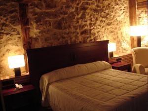 Postel nebo postele na pokoji v ubytování Posada Los Templarios