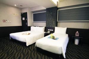 Letto o letti in una camera di Hotel 6 - Ximen