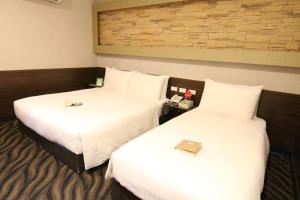 Letto o letti in una camera di Hotel 6 - Ximen