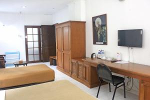 TV a/nebo společenská místnost v ubytování Hotel Winotosastro Garden