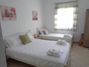 A bed or beds in a room at Studio near the sea
