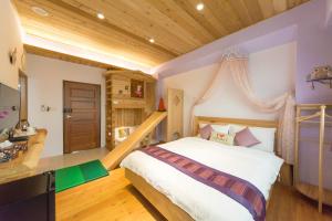Voodi või voodid majutusasutuse Shang Shui Yun Ji B&B toas