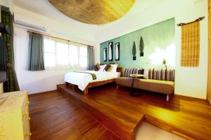 Letto o letti in una camera di Tang Chao B&B