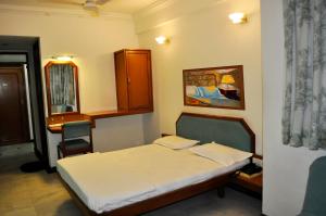 Postel nebo postele na pokoji v ubytování Hotel GRG + 37 fotografií
