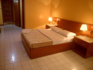 Katil atau katil-katil dalam bilik di Hotel Soriente