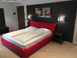 Postel nebo postele na pokoji v ubytování Hotel Villa Rosa
