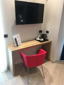 TV a/nebo společenská místnost v ubytování Hotel Villa Rosa