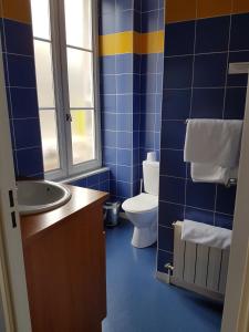 Koupelna v ubytování Hotel Le Saint Georges