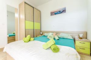 Postel nebo postele na pokoji v ubytování Apartments Nives Suhi Potok