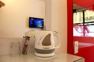 Kuchyň nebo kuchyňský kout v ubytování Time Hotel