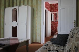 Posezení v ubytování City Center Kaķis B&B