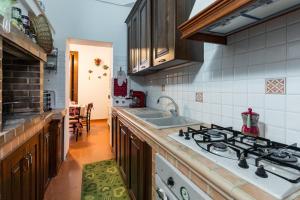 Kuchyňa alebo kuchynka v ubytovaní Palazzotto
