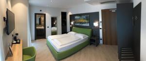 Postel nebo postele na pokoji v ubytování Hotel Villa Rosa + 37 fotografií