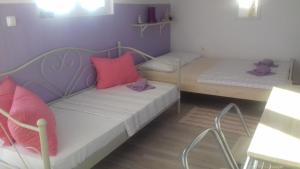 Posteľ alebo postele v izbe v ubytovaní Gospodar Apartments