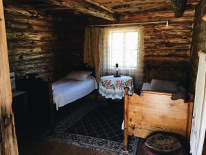 Postel nebo postele na pokoji v ubytování Guest House Viesu Māja Klētnieki