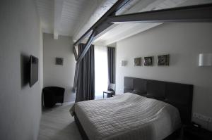 Postel nebo postele na pokoji v ubytování Hotel Nika 2