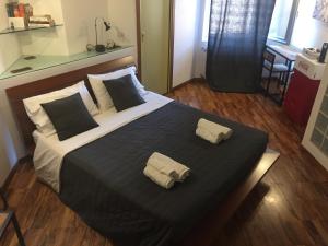 Postel nebo postele na pokoji v ubytování B&B Treviglio