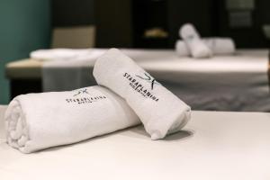Giường trong phòng chung tại Hotel Stara Planina