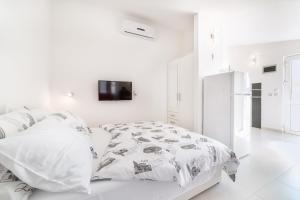 Giường trong phòng chung tại Apartments Lipic