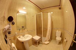 Koupelna v ubytování Amani Hotel Suites & Spa
